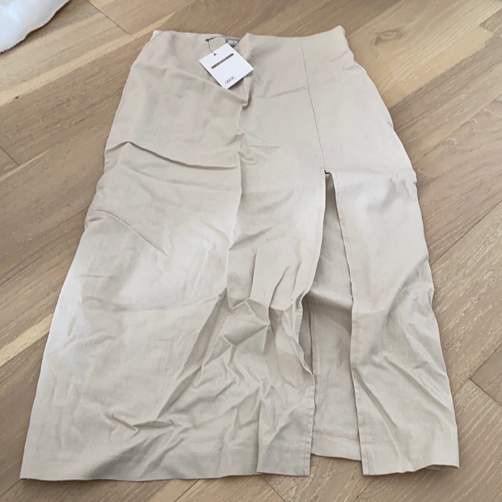 Cream mid length skirt